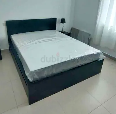 IKEA malam queen‑size bed (160 × 200 cm) with 2 storage drawers underneath and an IKEA mattress