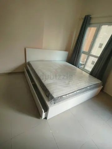 IKEA malam king size bed with IKEA mattress 180×200cm and 2 storage drawers underneath is available