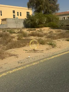 Two adjacent plots of land for sale in Al-Hooshi area, each measuring 10,000 square feet. Unbelievab