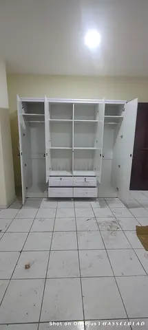 We are selling 4 door wood wardrobe brand new available