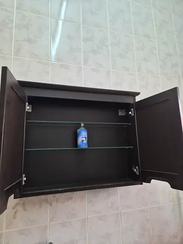 Dark Wood Storage Cabinet with Glass Shelves