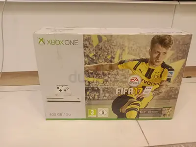 Xbox one with fifa 17 and fifa 23 with 2 controllers with disc drive white color priced at 450