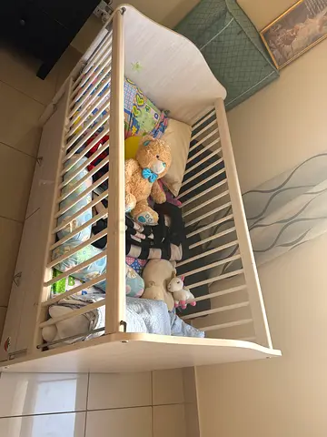 Wooden Crib with Bedding