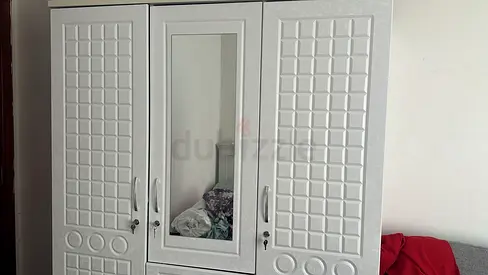 Stylish White Armoire with Mirror