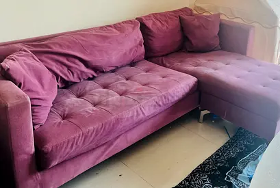 Cozy Purple Sofa in used Condition