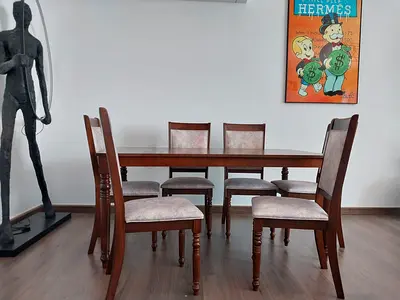 Brand new dining table with 6 chairs available