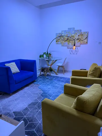 Blue Velvet Sofa  Two Yellow Armchairs