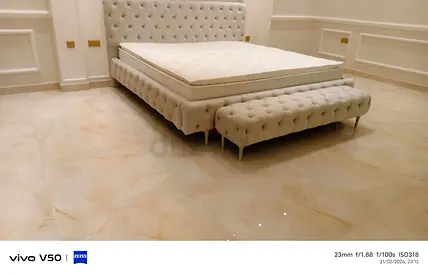 Elegant King Size Bed with Plush Headboard