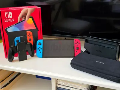 Nintendo Switch OLED Model with 4 Controllers, additional 512GB Micro SD Card, and UGREEN Case