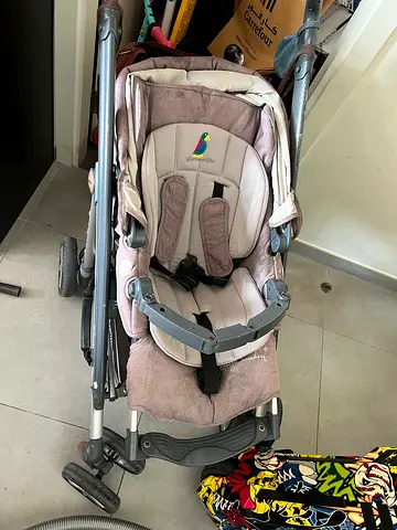 Stroller with reversible seat and interchangeable infant car seat