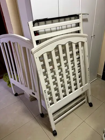 White wooden Baby crib