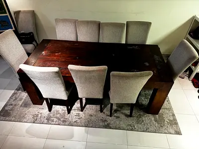 Heavy Wooden Dining Table with Plush Chairs