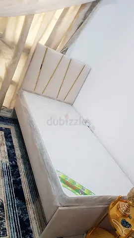 Selling brand new single bed with mattress