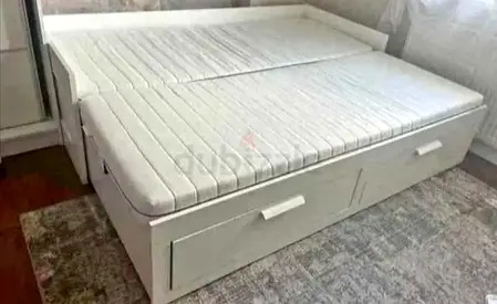IKEA brimness  Day bed with 2 storage drawers underneath and with 2 IKEA mattresses