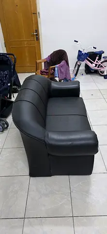 Good condition Two seater sofa (with cover) for sale