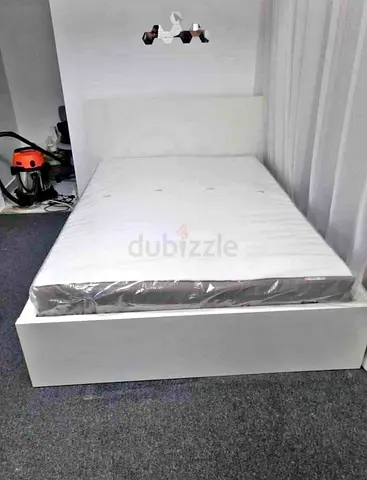 IKEA malam double‑size bed (140 × 200 cm) with 2 storage drawers underneath and an IKEA mattress