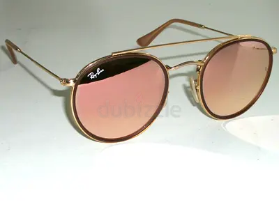 Ray-Ban RB3647N Round Double Bridge sunglasses.
