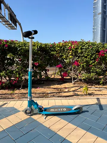 Micro Sprite ocean blue LED kick scooter