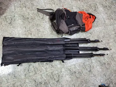 Camera stand with back-pack