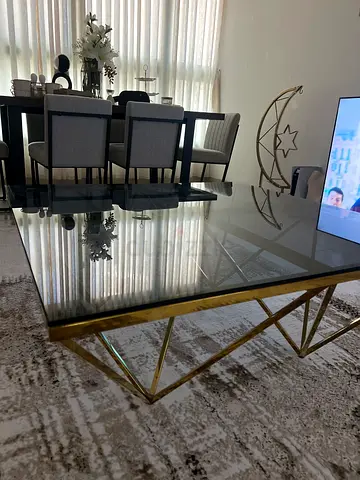 Stylish Glass Coffee Table with Elegant Gold Accents