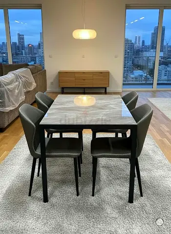 4 Chairs Dining Set. Stylish marble finish, well maintained.