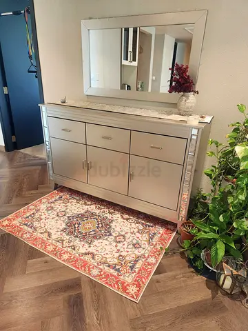 Elegant Modern Cabinet with Decorative Rug