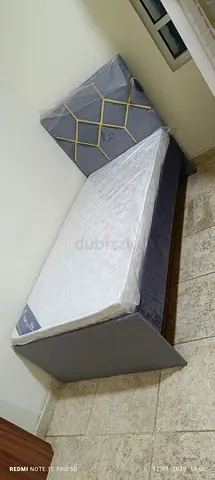 We are selling single size bed frame including mattress brand new available