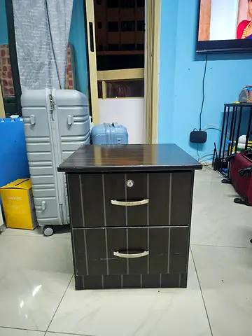 2 Stylish Wooden Nightstand with Drawers. AED 50, Urgent sale