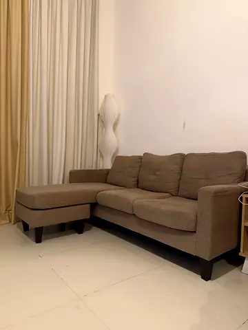L shaped walnut colour sofa