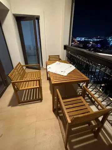 Balcony furniture: 1 table , 2 armchairs and one bench for 4 people.
