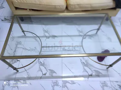 Stylish Glass Coffee Table with Gold Finish