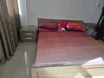 Cozy Bed with Stylish Nightstand and Mattress
