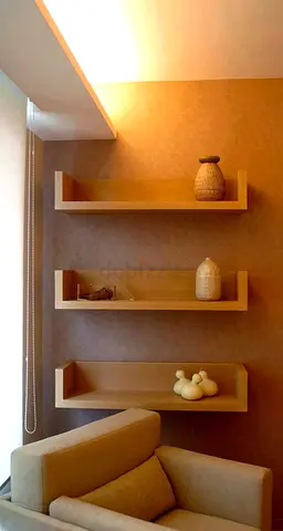 Contemporary Built-In Display Shelves with Wooden Finish and Hidden Storage
