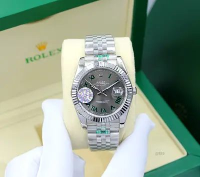 Rolex Datejust Watch with Silver Bracelet and Green Dial