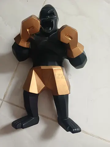 Muscular Action Figure with Dumbbells