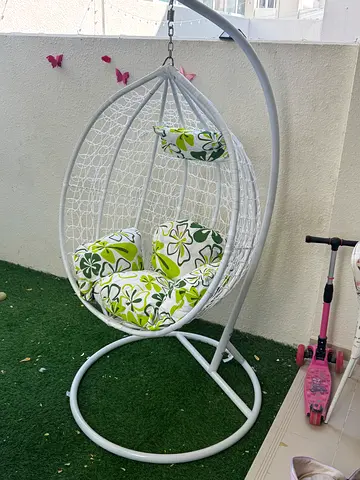 Cozy Hanging Chair with Floral Cushions