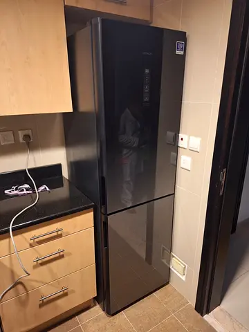 Hitachi Stylish black top fridge bottom freezer with digital