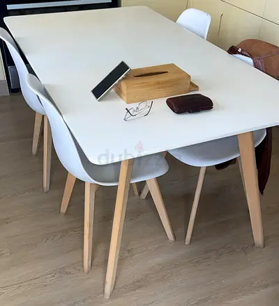 Modern White Dining Table with Stylish Chairs