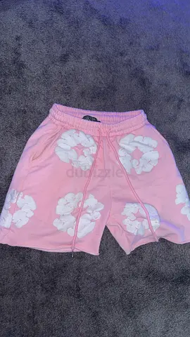 Pink denim tears shorts