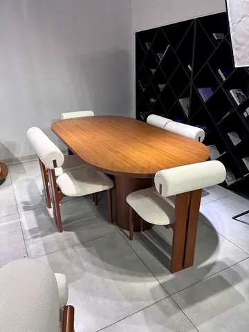 Minimalist Oval Dining Table with Textured Pedestal Support