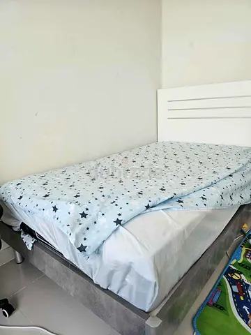 Simple Single Bed with Comforter