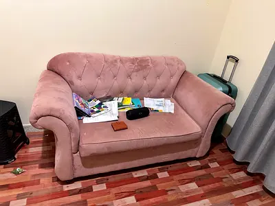 Comfortable Pink Sofa in Good Condition