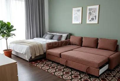This stylish L-shaped sofa bed combines modern design