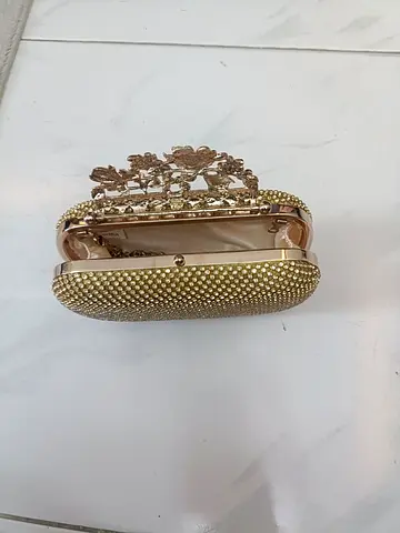 Golden clutch for party