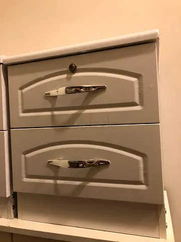 White Storage Cabinet with Elegant Handles
