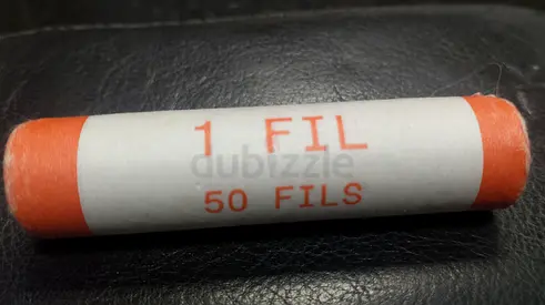 UAE one fils coin rollVintage Coin with Palm Tree Design