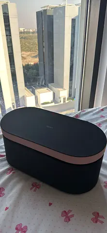 Dyson hair dryer  Curles brushes