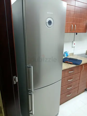 Daewoo bottom freezer fridge 60cm width 180cm height  .