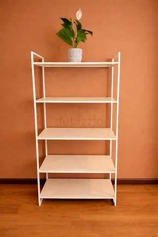 Stylish White Storage Rack for Kitchen or Storage Space