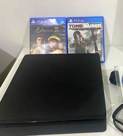 Sony Playstation 4 slim with games and controller